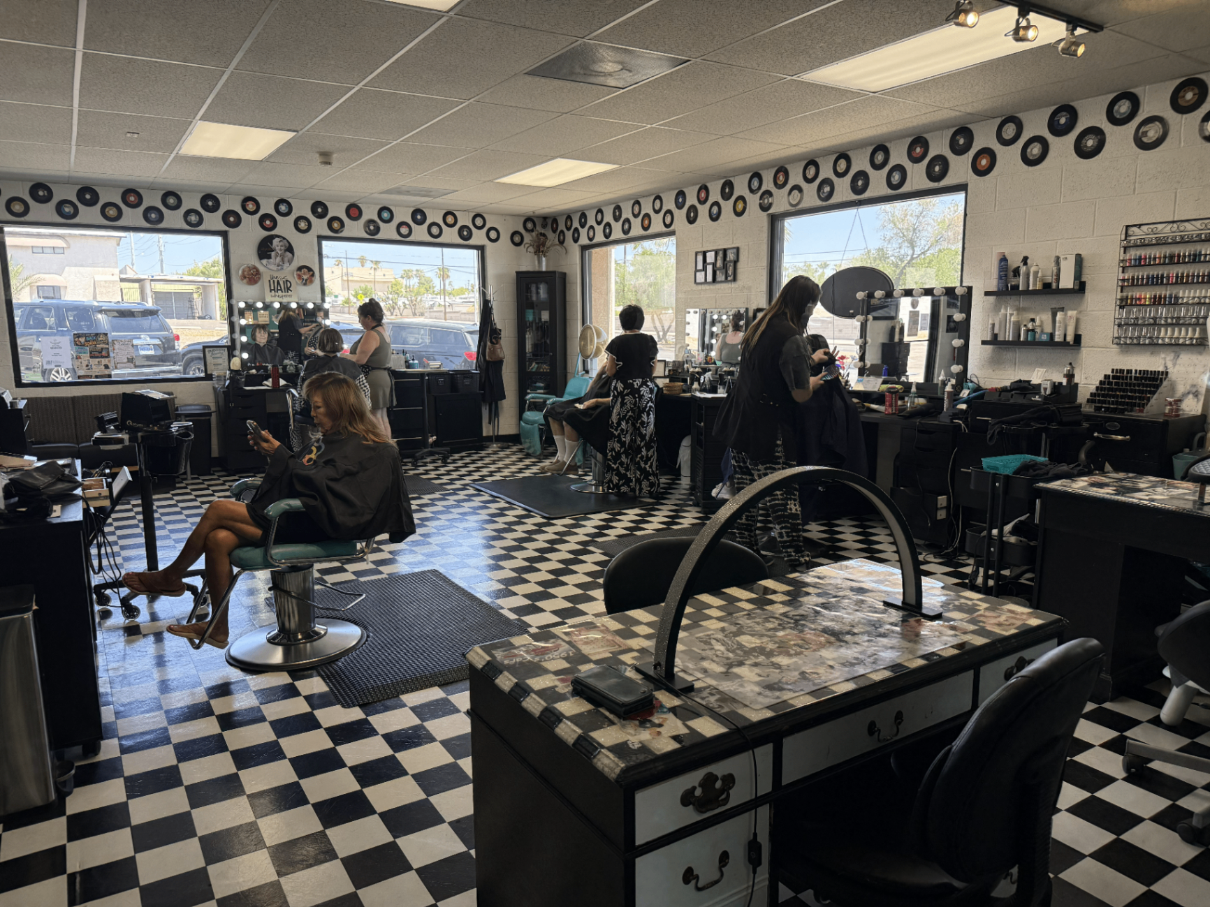 Rock N Beauty salon interior with clients and stylists
